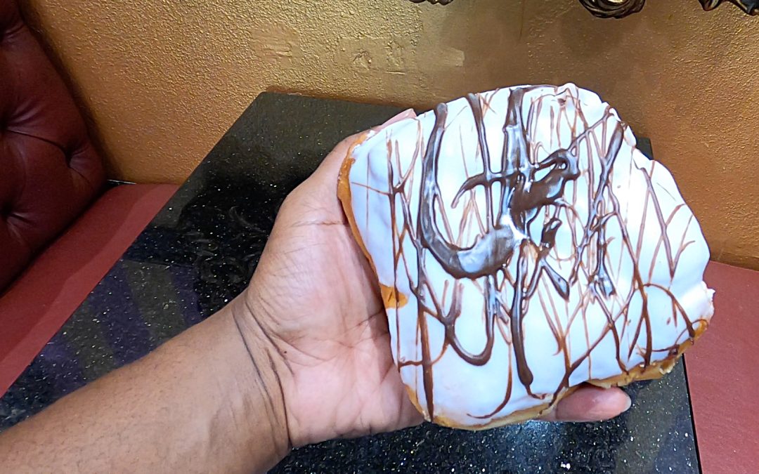 Delicious Stuffed Cookie Dough Donut Rising in Tampa at Dough